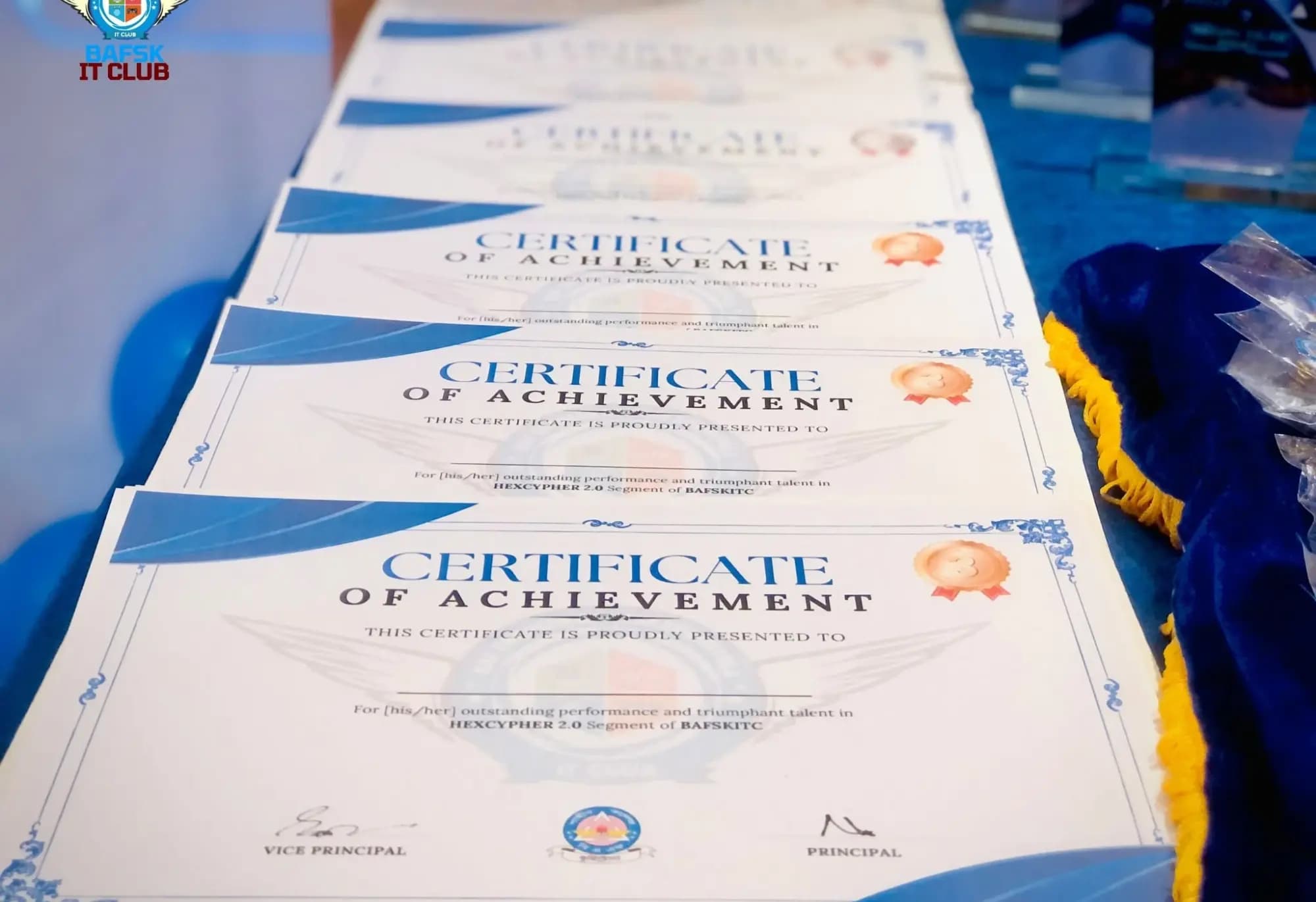 Certificates of achievement from a club event